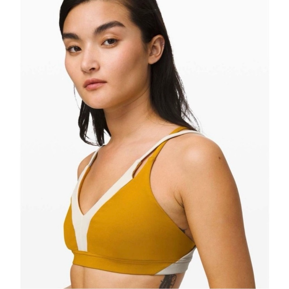 Lululemon “new ambition” sports bra in mustard yellow. New with tags.